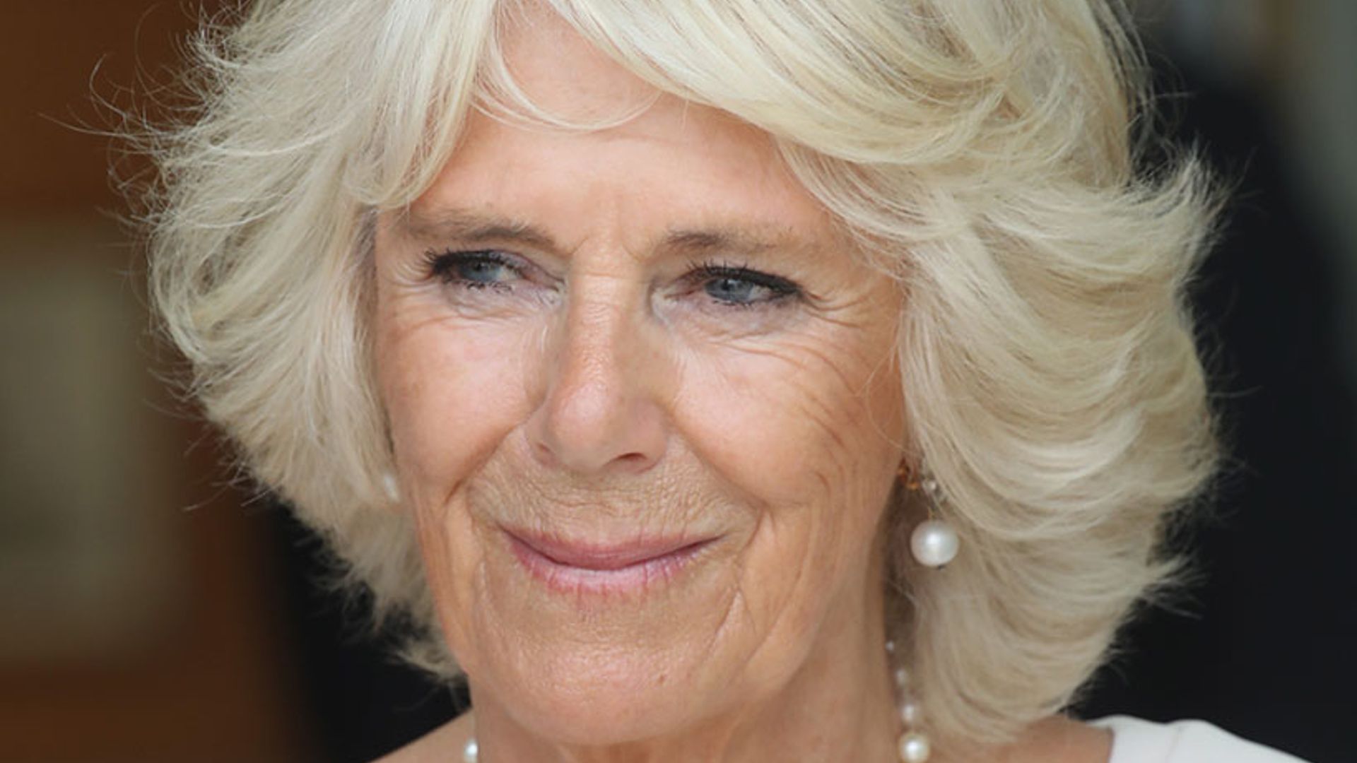 The Duchess of Cornwall is pretty in pink and wow, what an outfit!