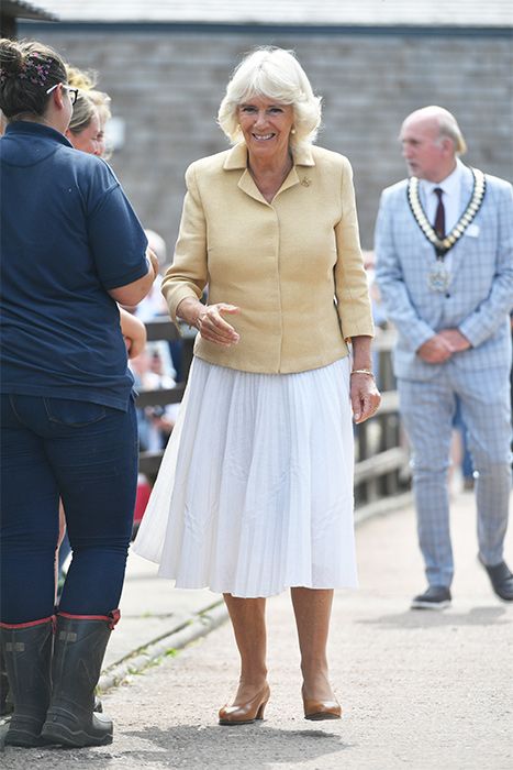 camilla-parker-bowles-outfit-yellow-jacket-white-skirt