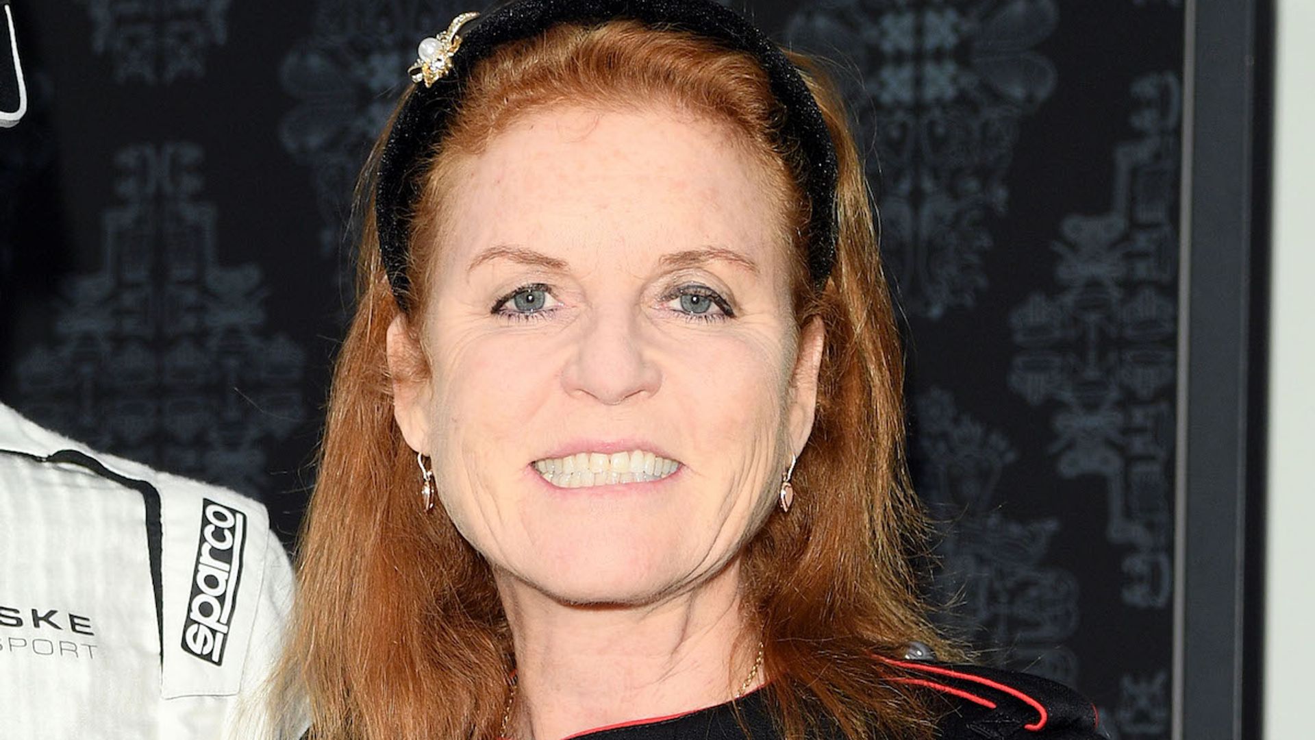 Sarah, Duchess of York wears designer shoes with a moving message behind them