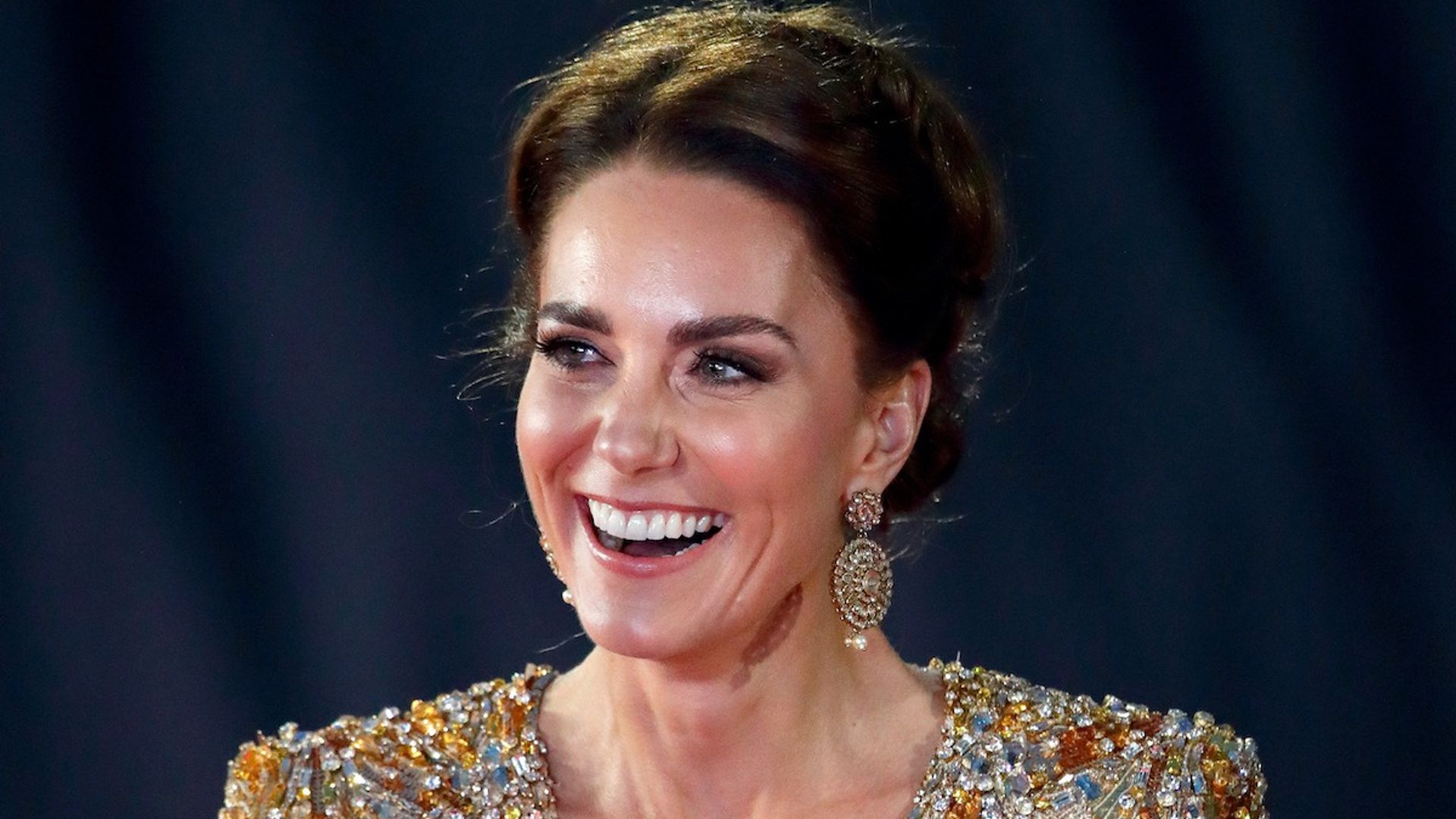 Kate Middleton's glittering gold gown really was made for a Bond Girl - story revealed