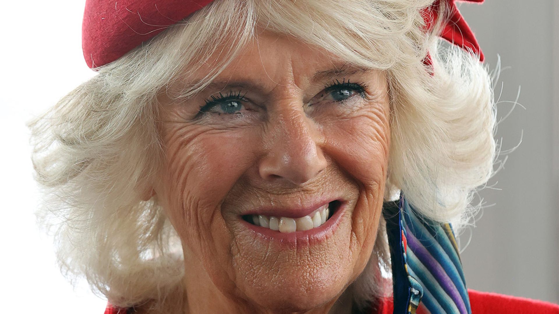 Duchess Camilla is sensational in red alongside The Queen and Prince Charles