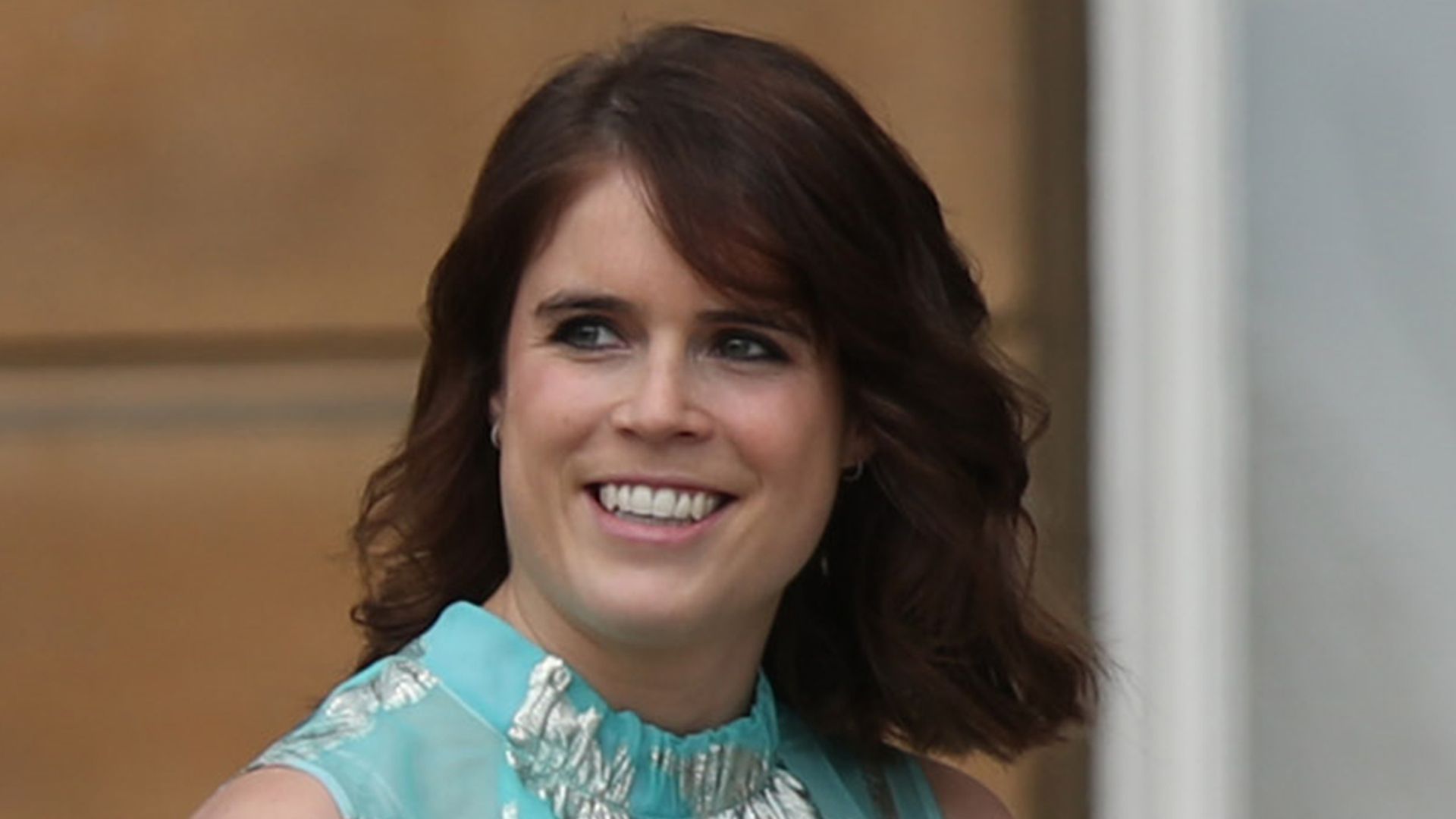 Princess Eugenie glams up in a coat that looks mighty like Meghan Markle's