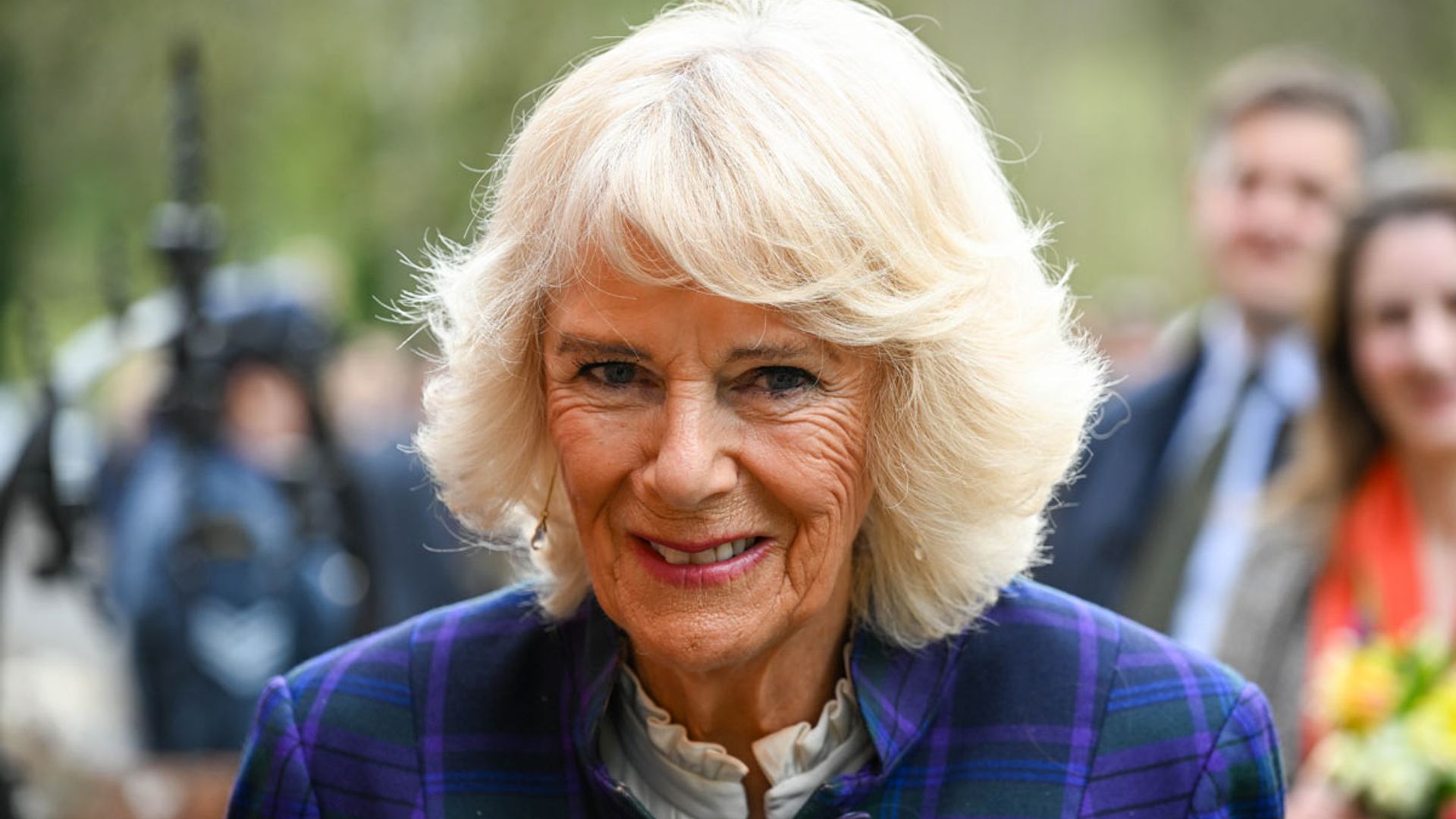 Duchess Camilla looks pretty in plaid suit and knee high boots