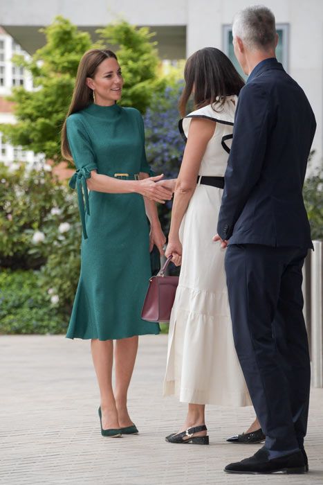 kate-shaking-hands