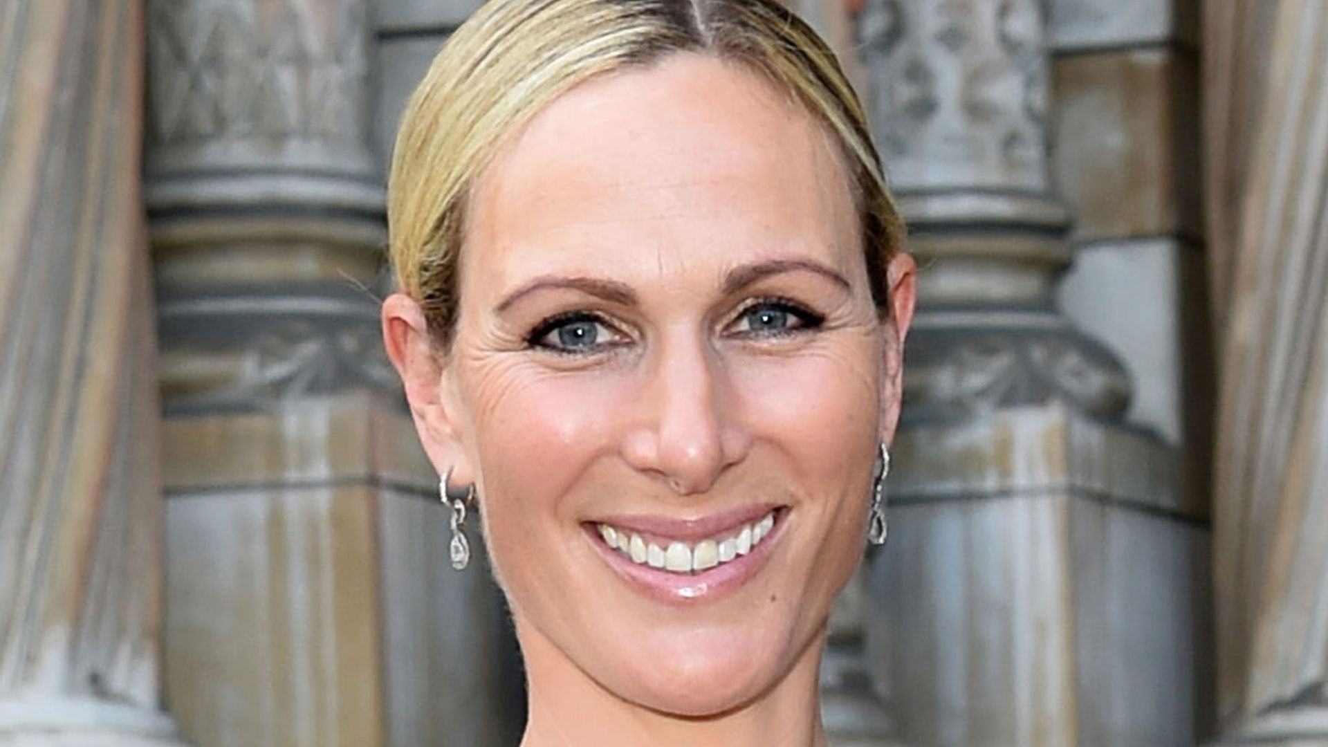Zara Tindall stuns in most dazzling dress at charity ball alongside brother Peter Phillips - photos