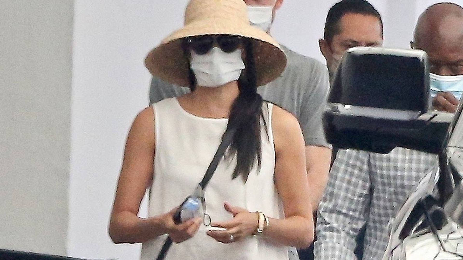Meghan Markle's heatwave-ready white linen dress is finally back in stock - and the reviews are incredible 