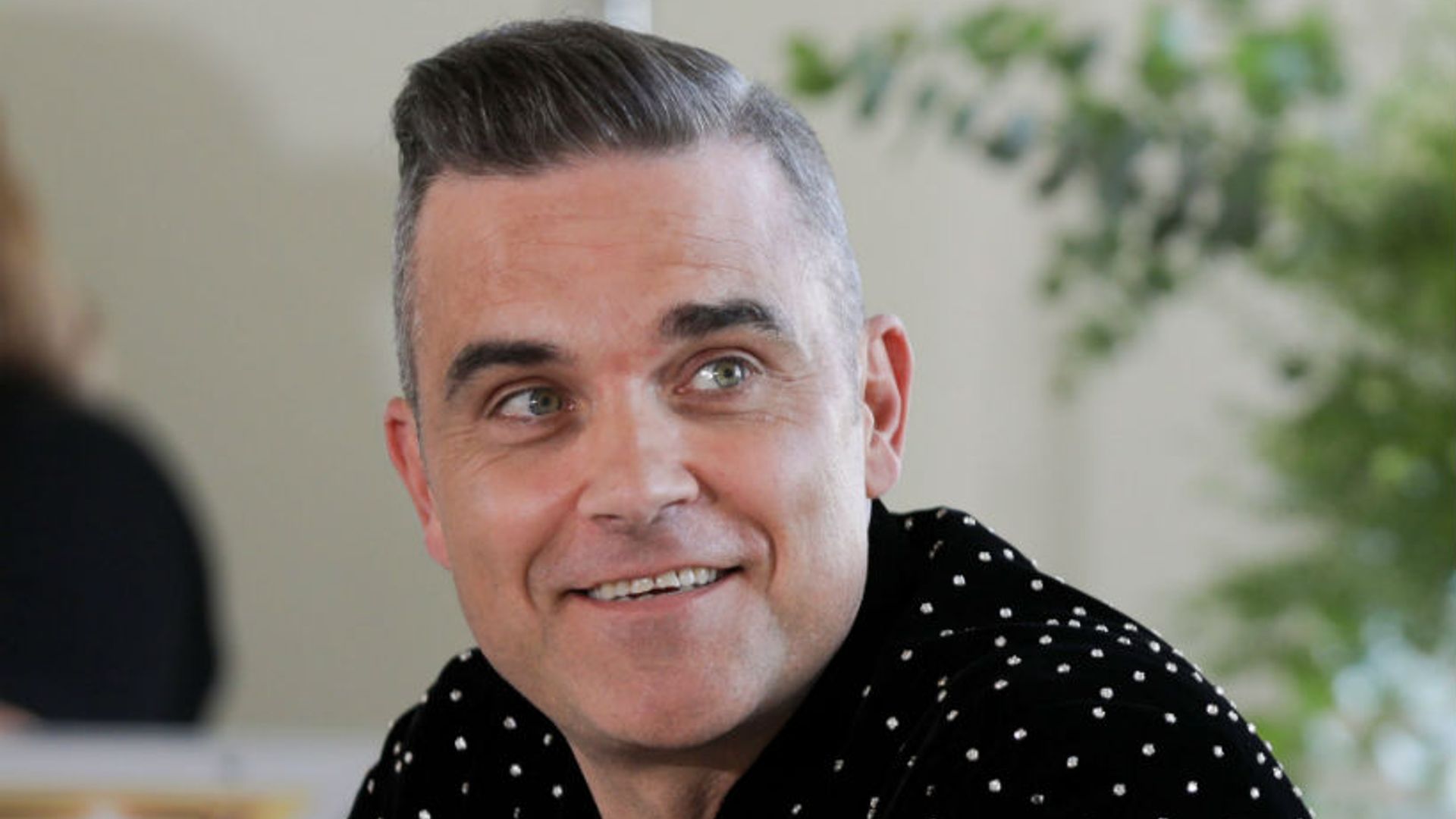 X Factor's new judge Robbie Williams hints his children will appear on the show