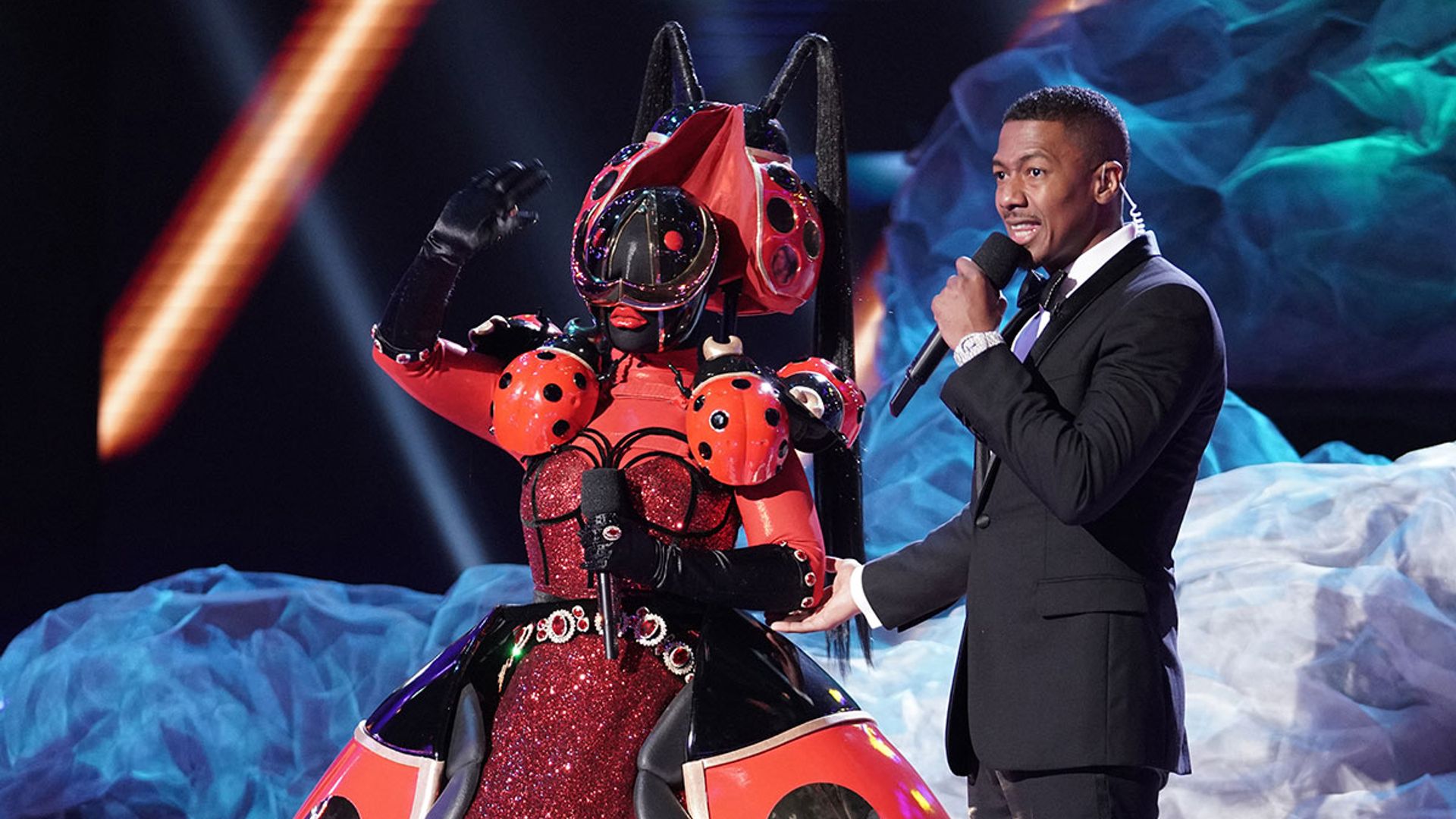 Which celebrities have been revealed on The Masked Singer US so far?