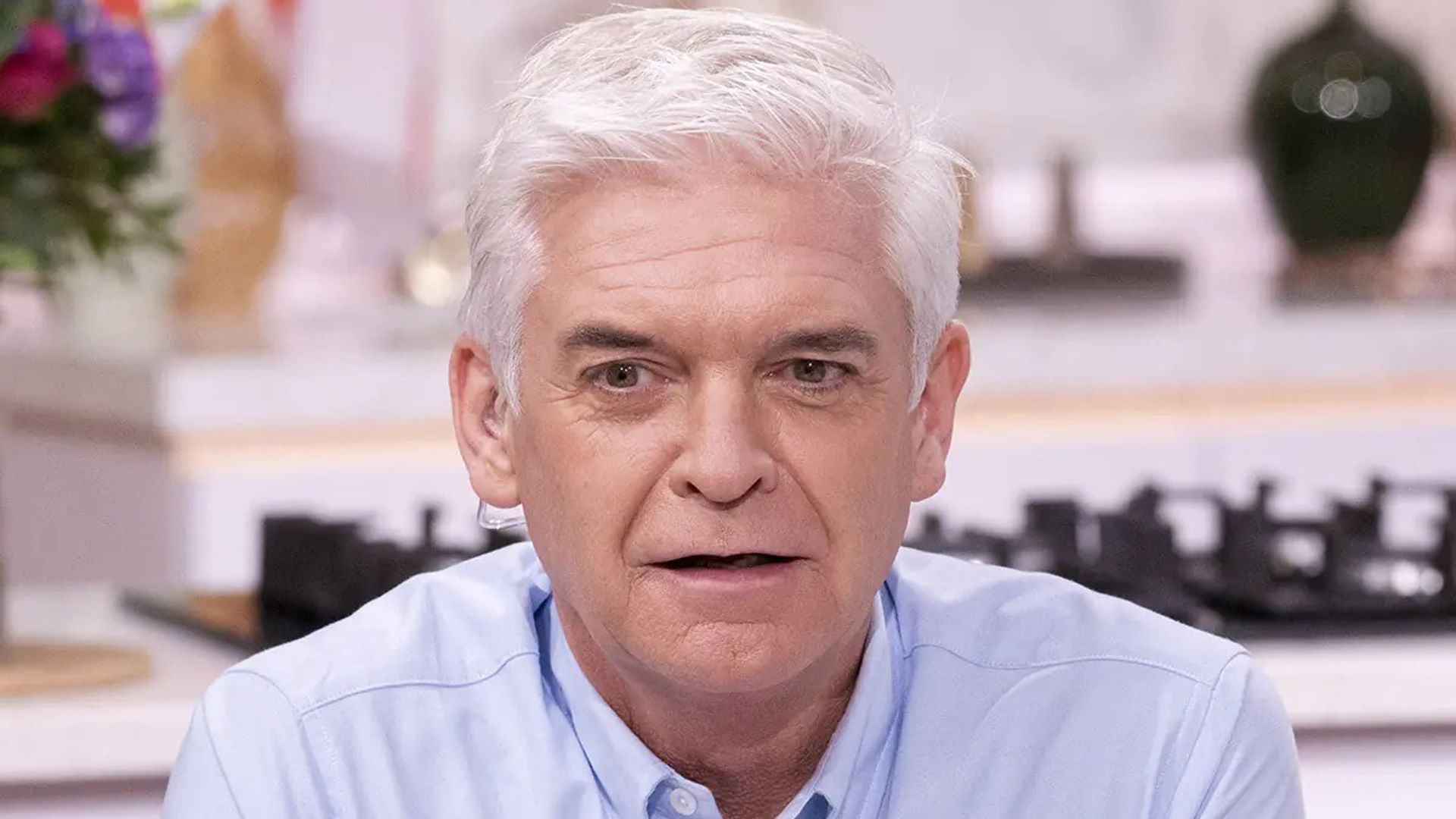 Phillip Schofield left red-faced after being caught on phone during live This Morning segment