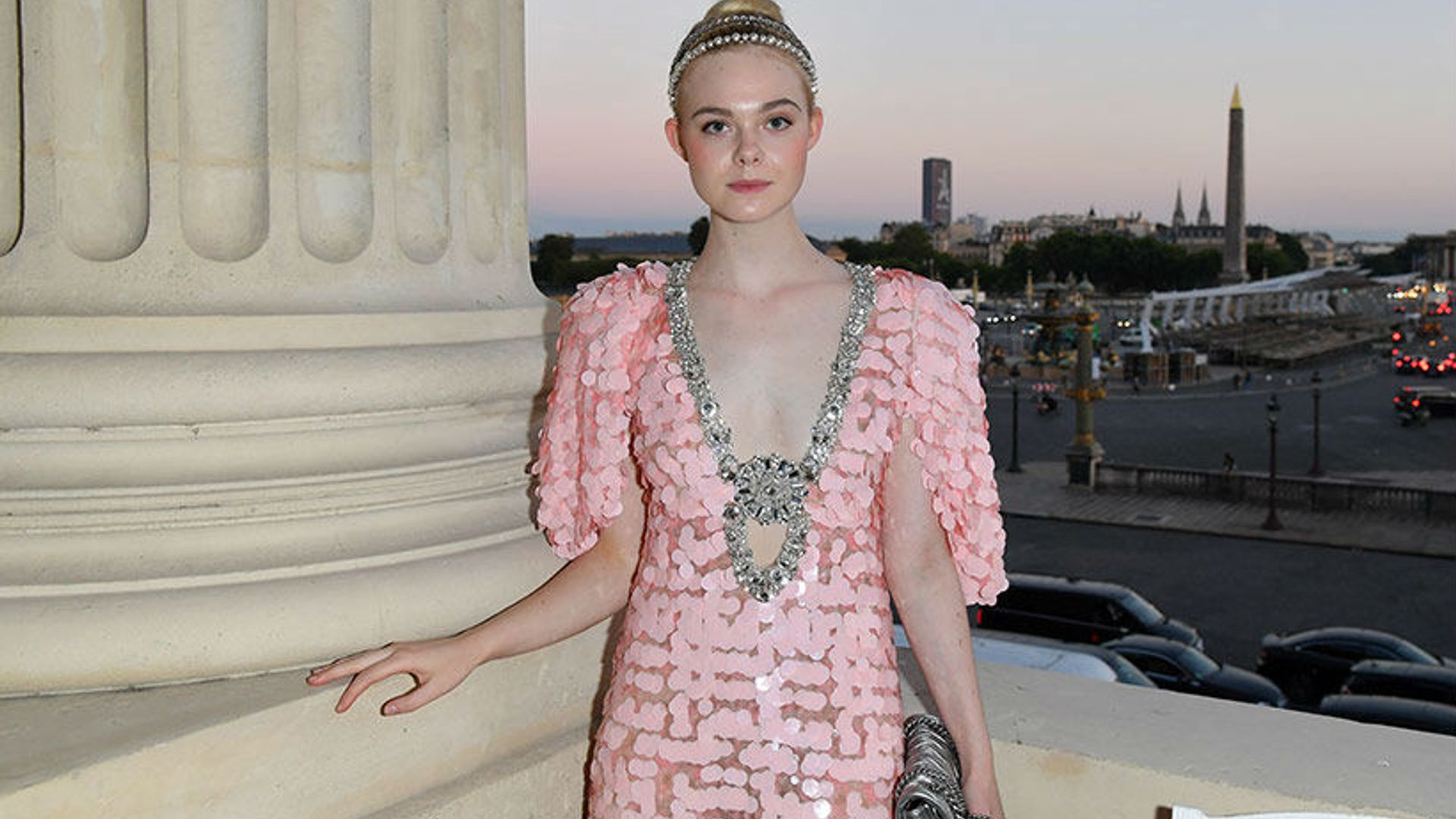 Elle Fanning trades signature blonde hair for a new dark 'do – and looks totally different!
