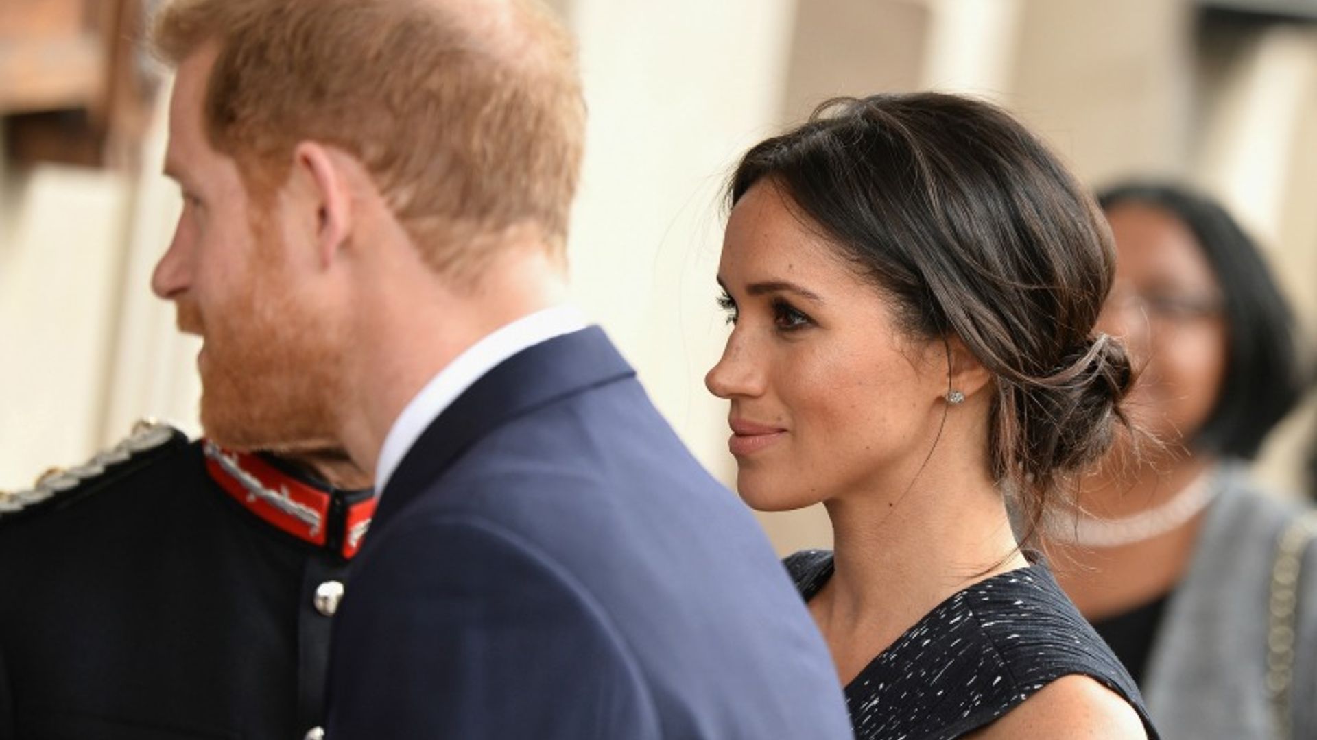 Meghan Markle recycles her casual bun hairstyle during appearance with Prince Harry