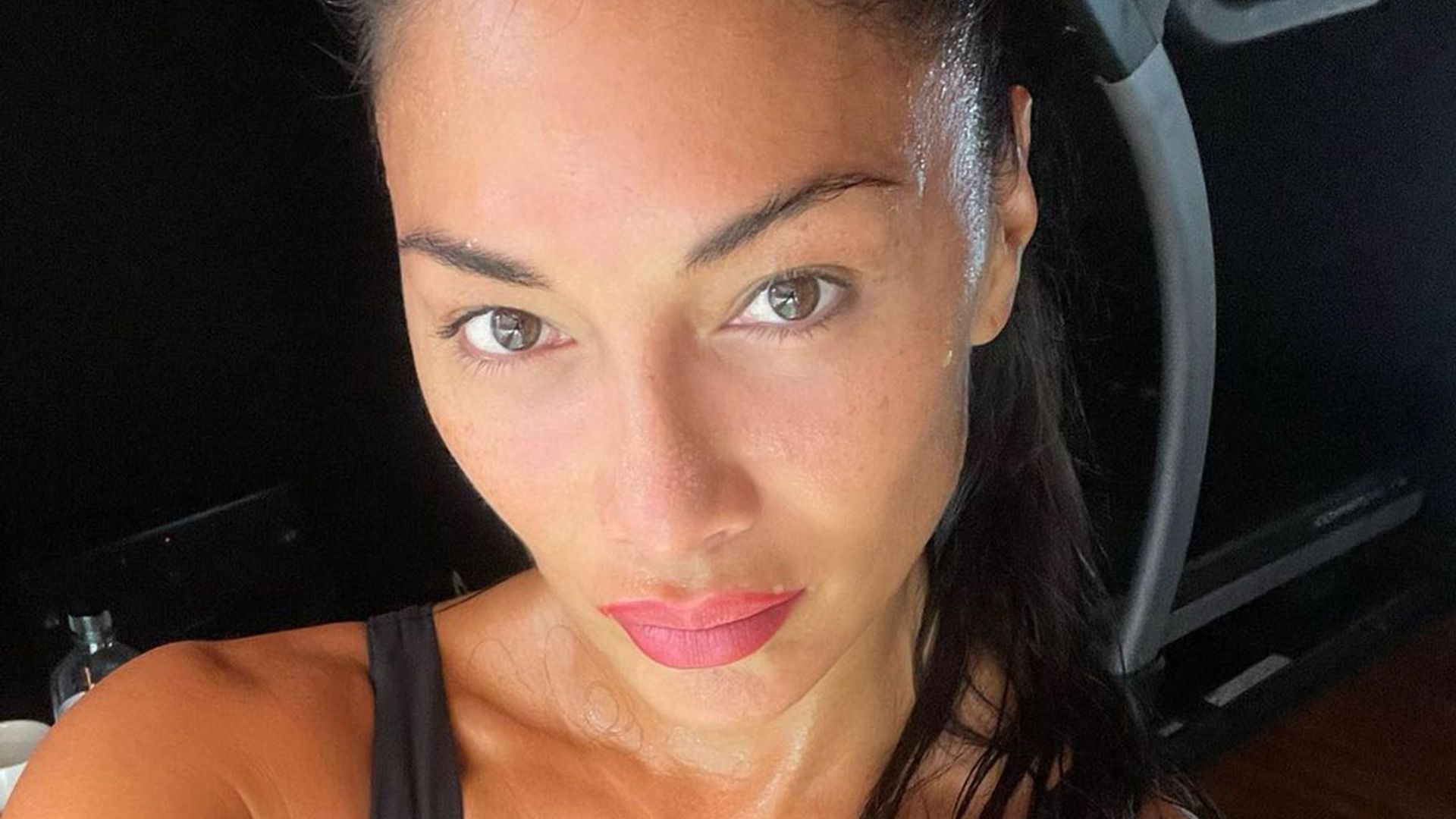 Nicole Scherzinger floors fans with sculpted abs in cheeky workout video