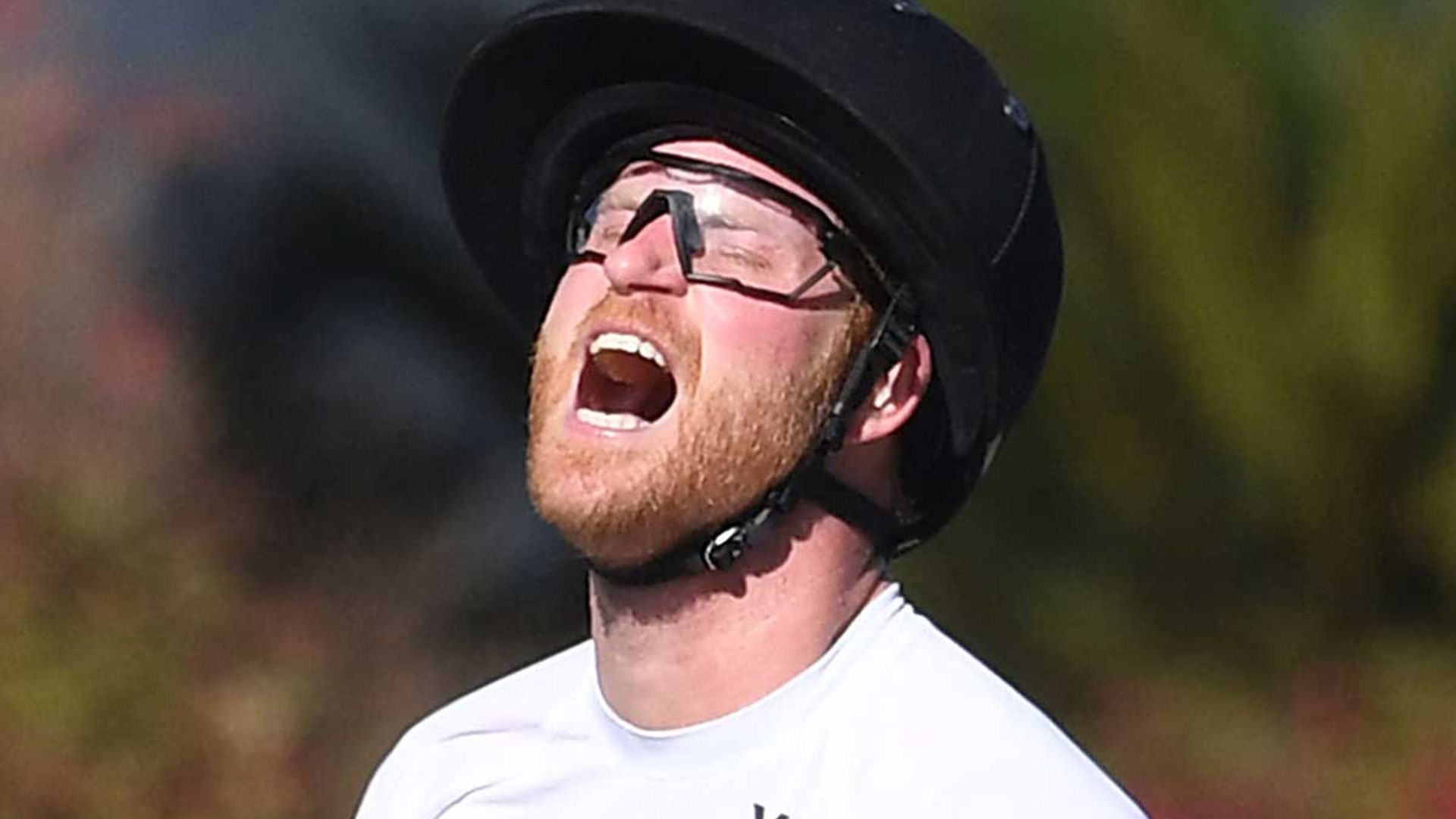 Prince Harry worries fans as he falls off his horse during polo match
