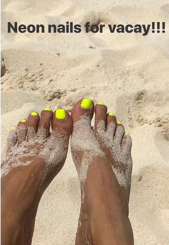 Kim Kardashian reveals neon yellow toe nail polish on Instagram whilst