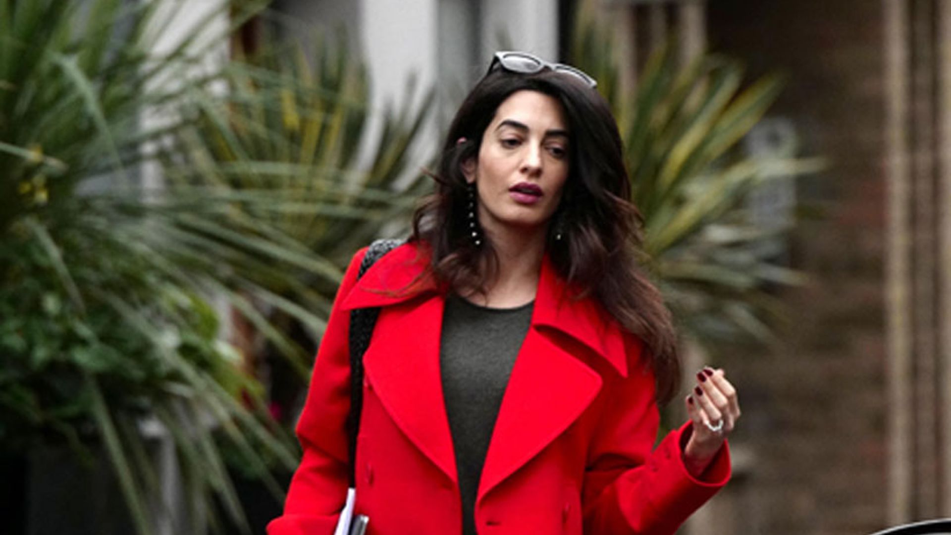 Amal Clooney stuns in red as she steps out with twin baby bump: pics!
