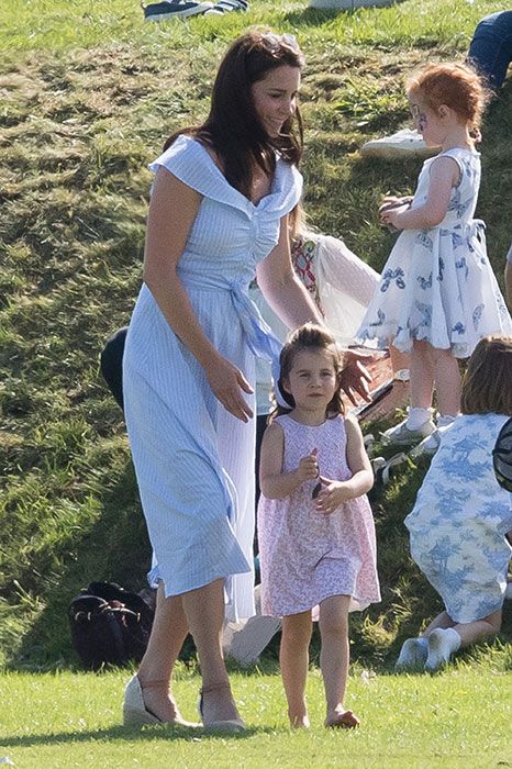 kate middleton with princess charlotte at the polo