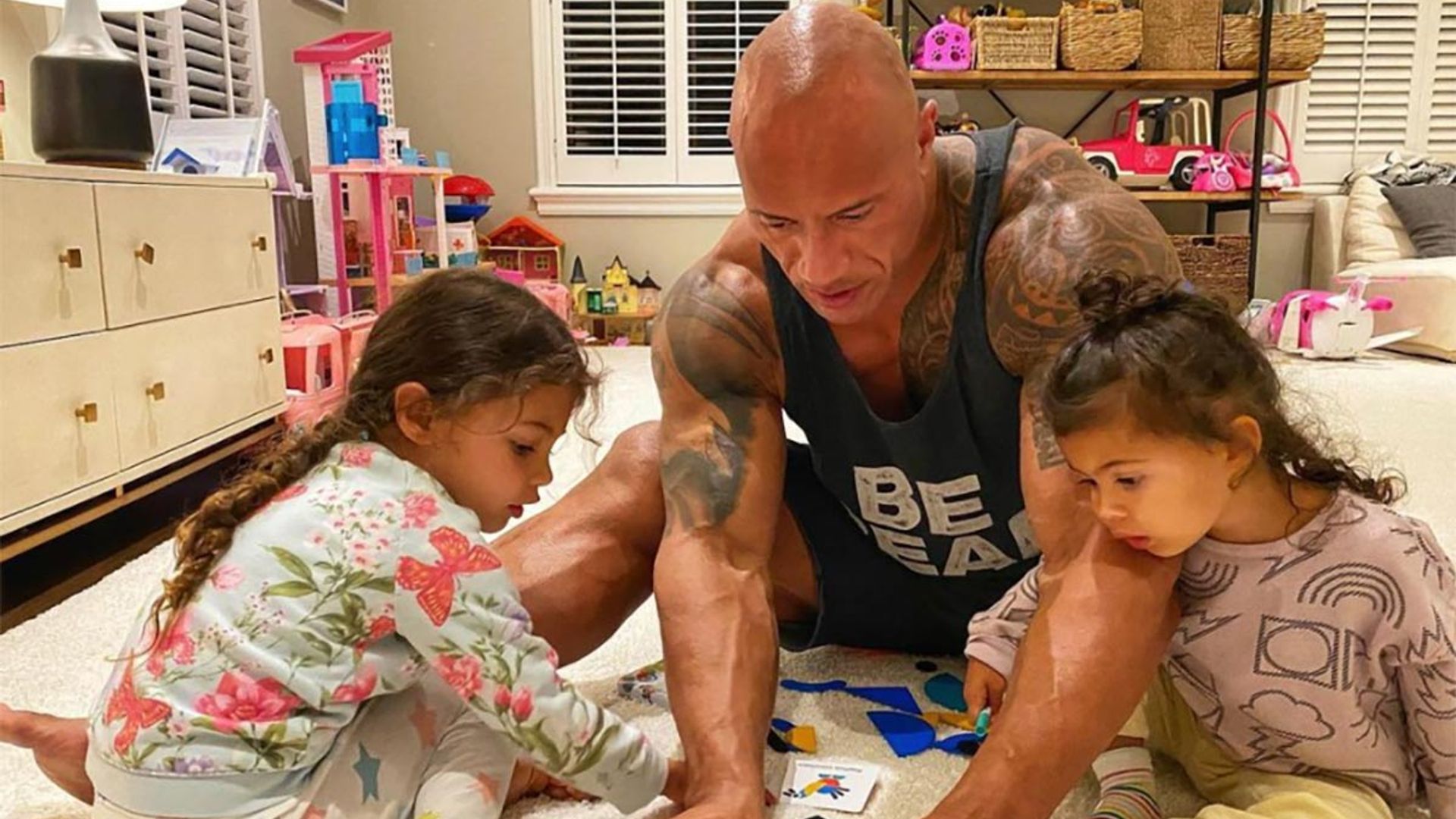 Dwayne The Rock Johnson playing with Barbie is the best picture you'll see today