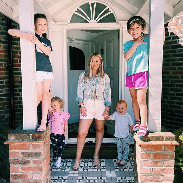 anna-saccone-standing-outside-house-with-kids