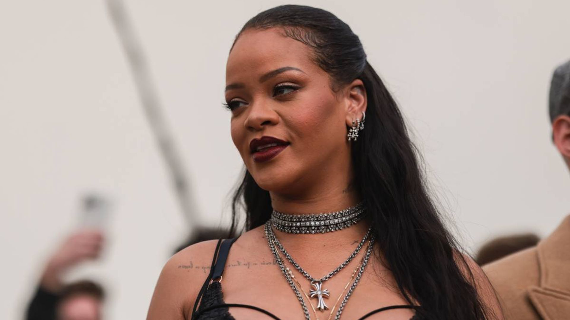 Rihanna turns heads as she reacts to comment on baby's gender during latest appearance