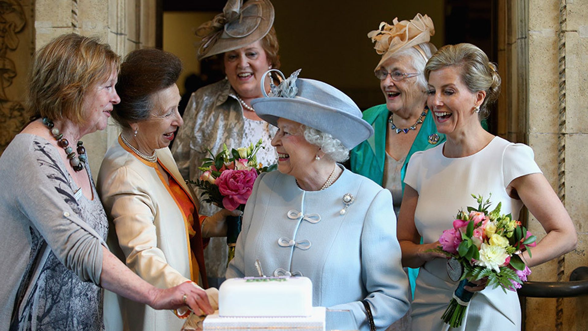Queen Elizabeth all smiles at WI event following rumored health scare