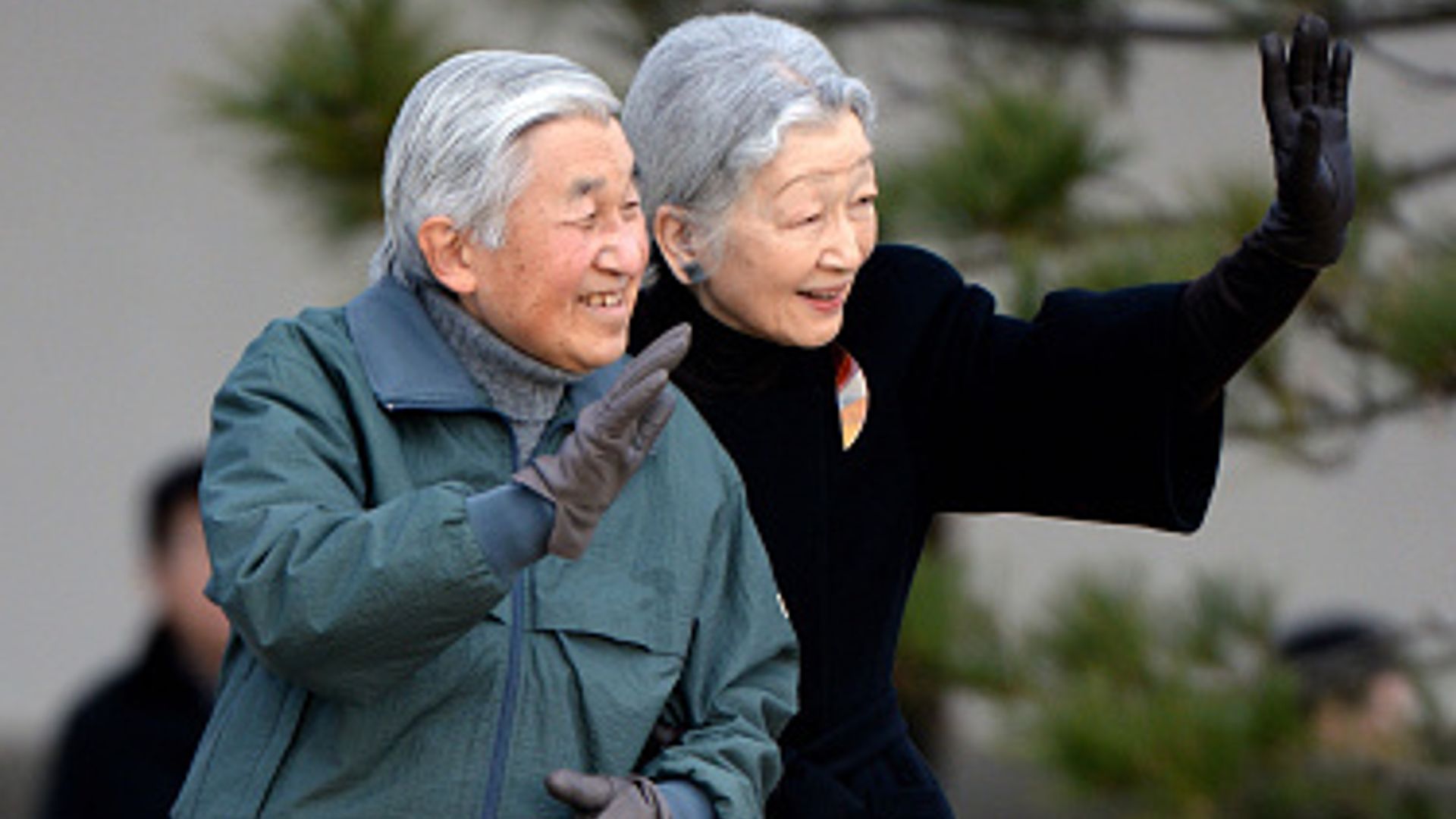 Japan's Emperor and Empress share sweet walk outdoors