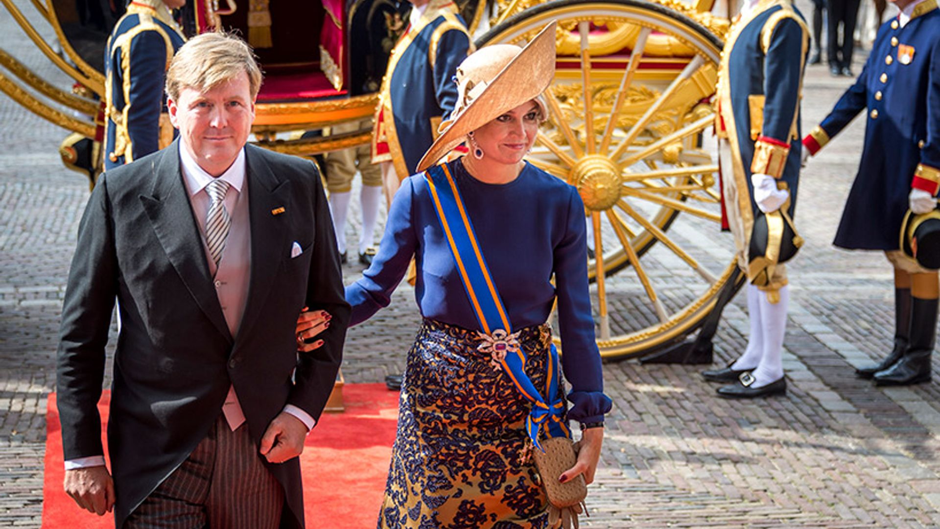 Queen Máxima of the Netherlands is radiant in gold for grand day out