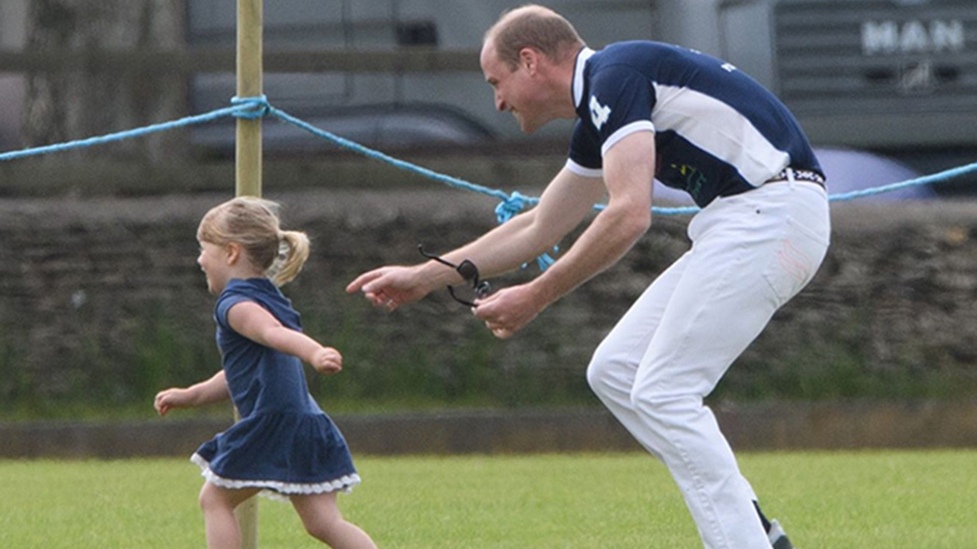 Prince William plays with adorable Mia Tindall at the polo - see the photos!