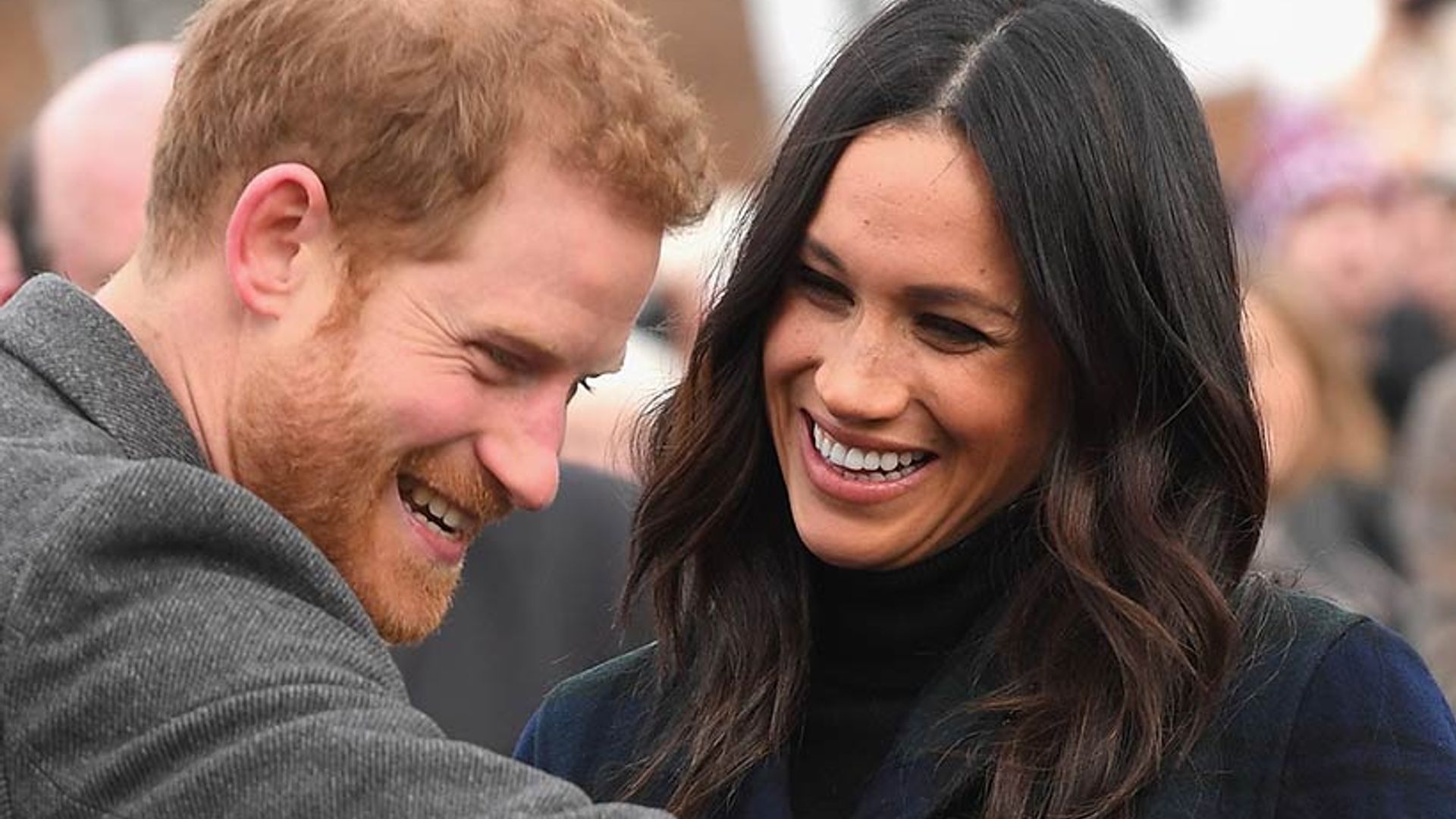 Prince Harry and Meghan Markle laughing 