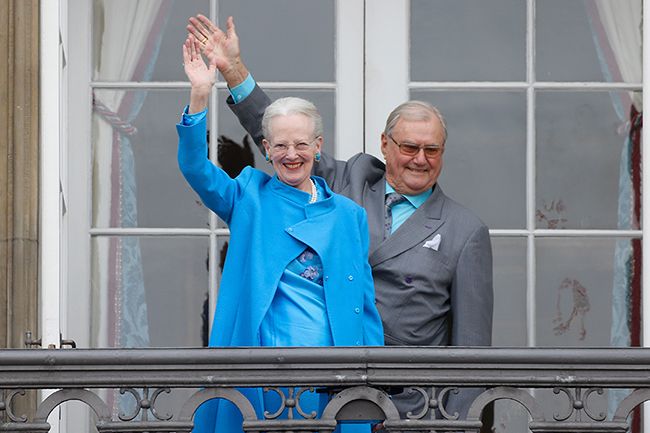 queen-margrethe-of-denmark-and-prince-henrik-on-palace-balcony