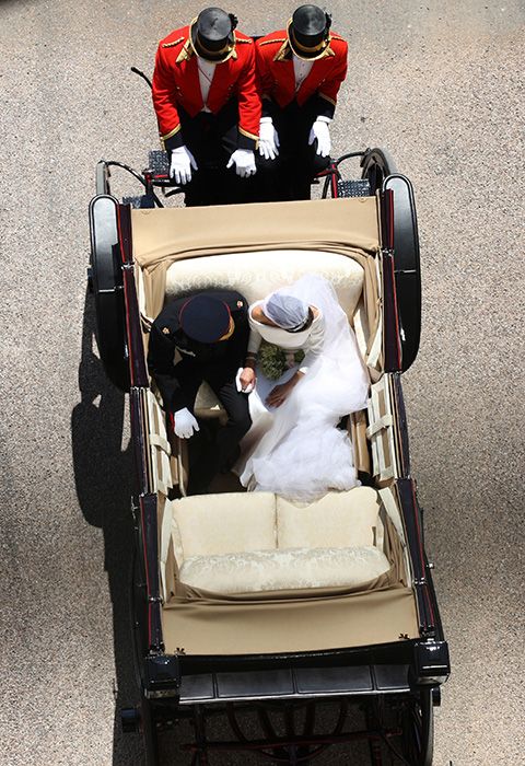 Prince Harry and Meghan Markle during carriage procession
