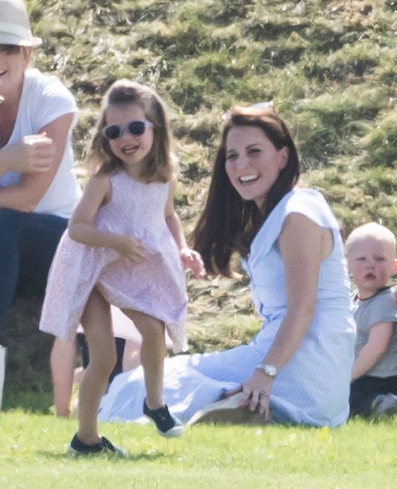 prince charlotte playing around at polo with keep middleton 