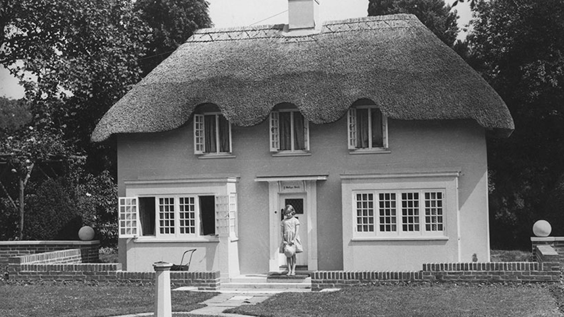 The Queen at her Wendy House