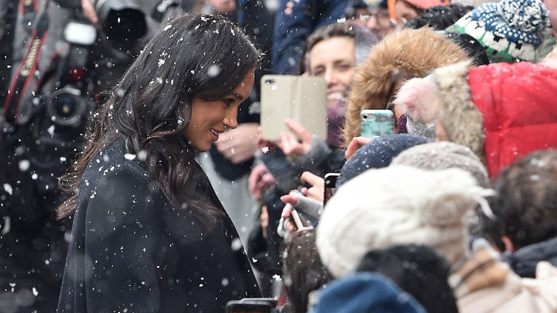 See the best photos from Prince Harry and Meghan Markle's snowy day in Bristol