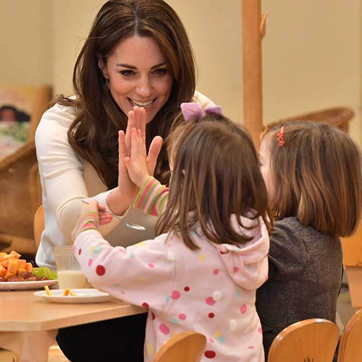 Duchess Kate loves a high five - her sweetest greetings with children over the years