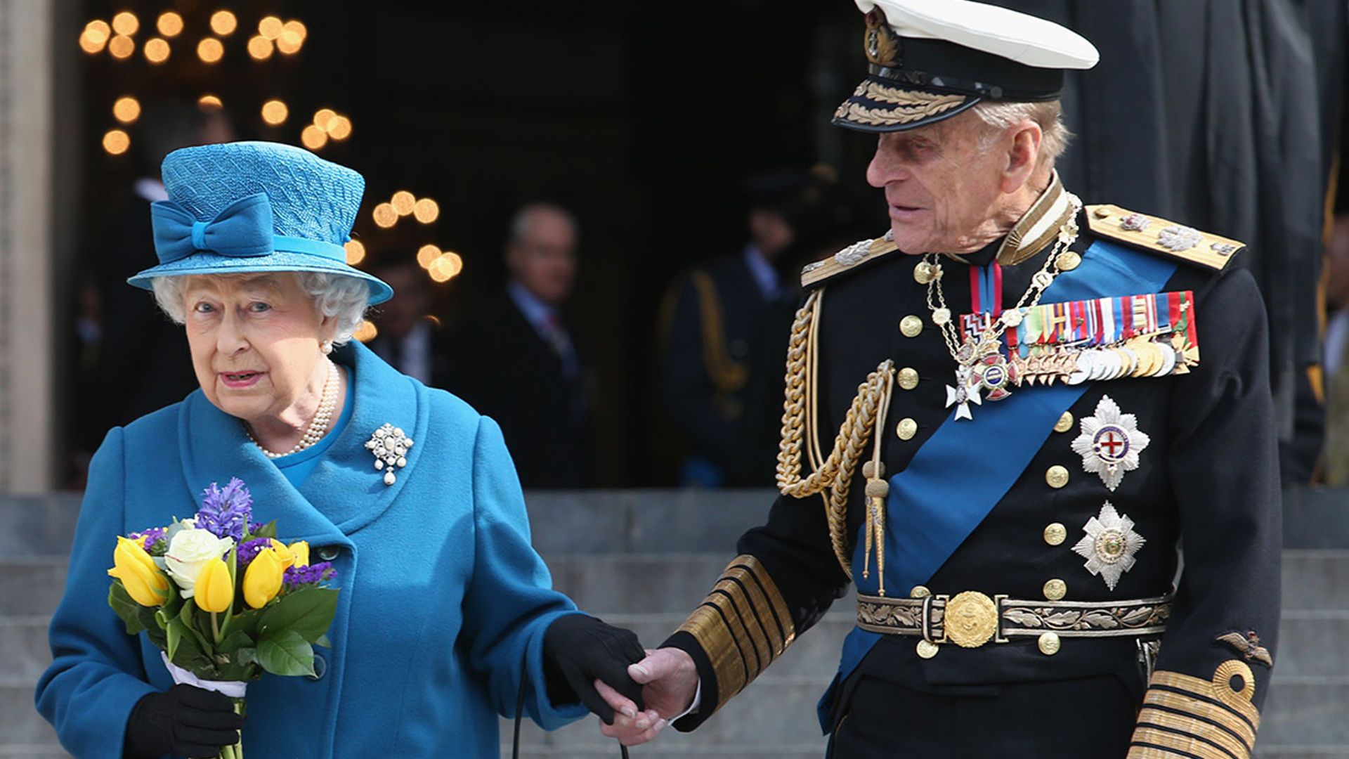 prince-philip-holding-queens-hand
