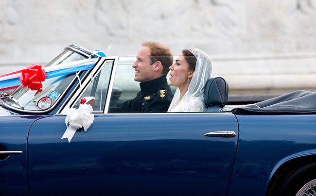 prince-william-and-kate-middleton-cheering-from-car