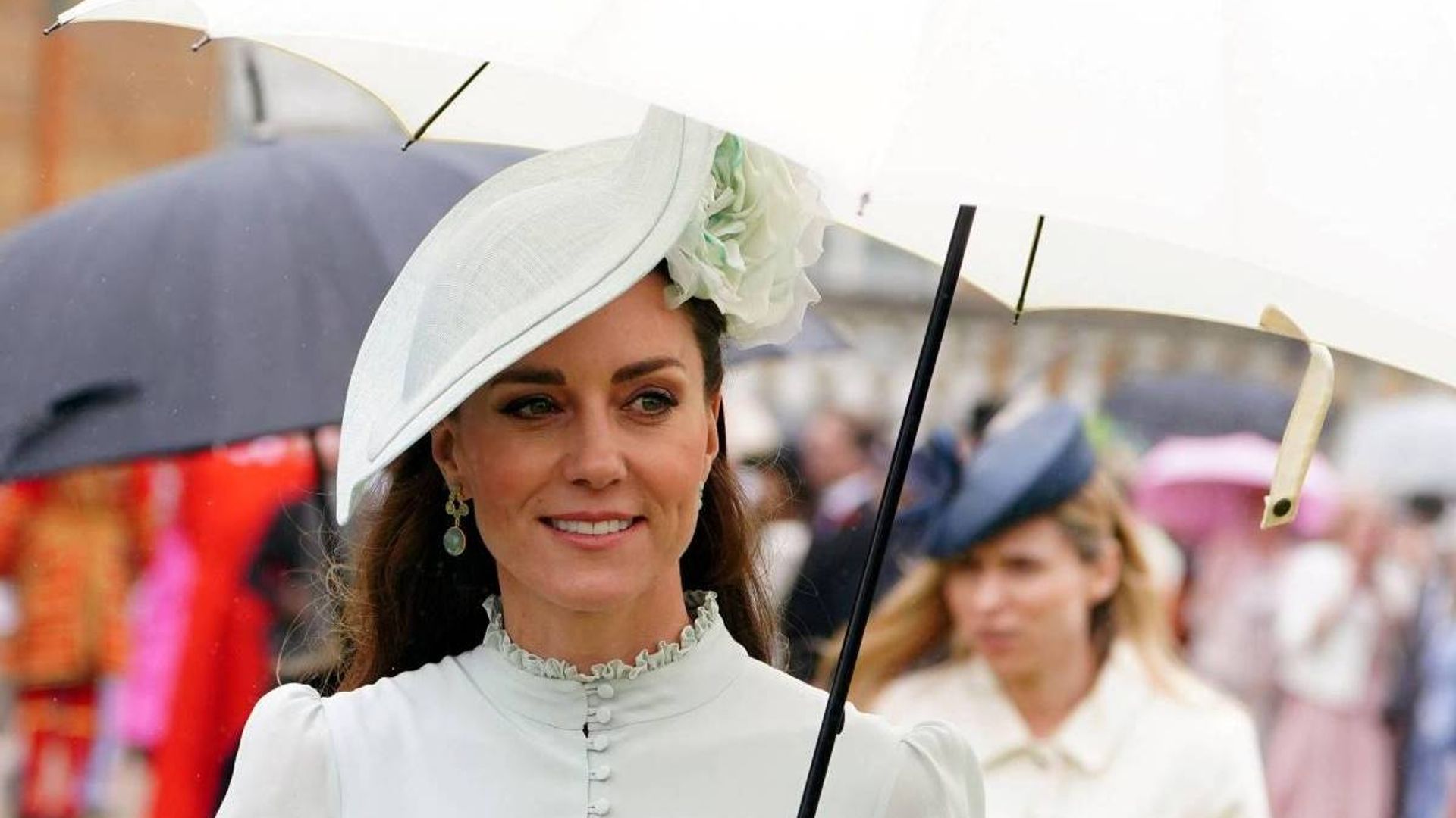 Kate Middleton and Prince William brave the rain to attend Buckingham Palace garden party – best photos