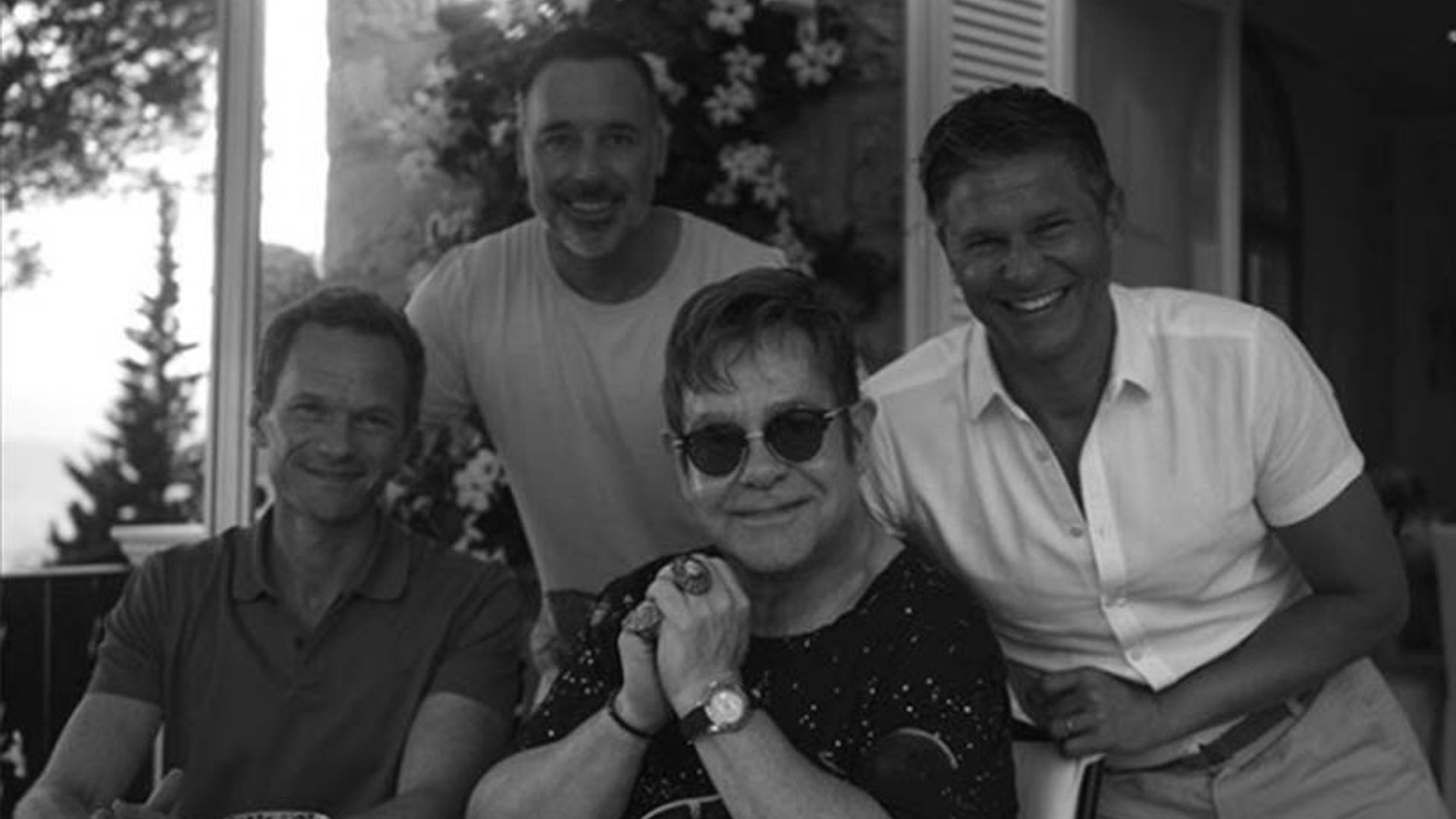 Sir Elton John and David Furnish enjoy star-studded holiday in Nice