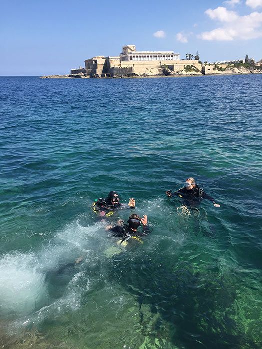Diving-off-Lido-at-Corinthia-St-Georges