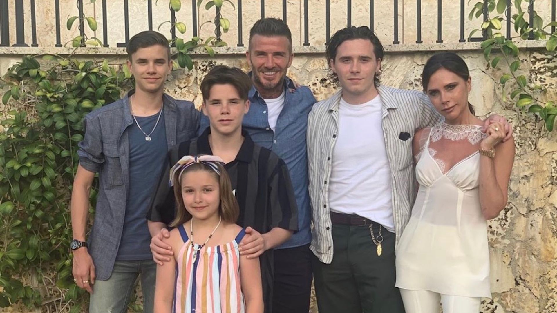 Inside the Beckhams' family holiday to Miami – David and Victoria cuddle up in the pool, Harper tries out fishing