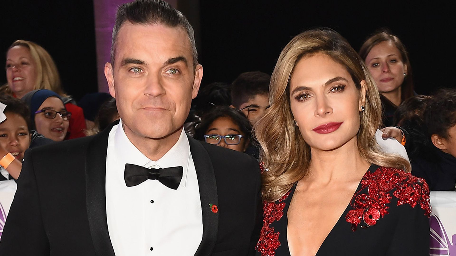 Robbie Williams and Ayda Field pose for rare family photo with ...