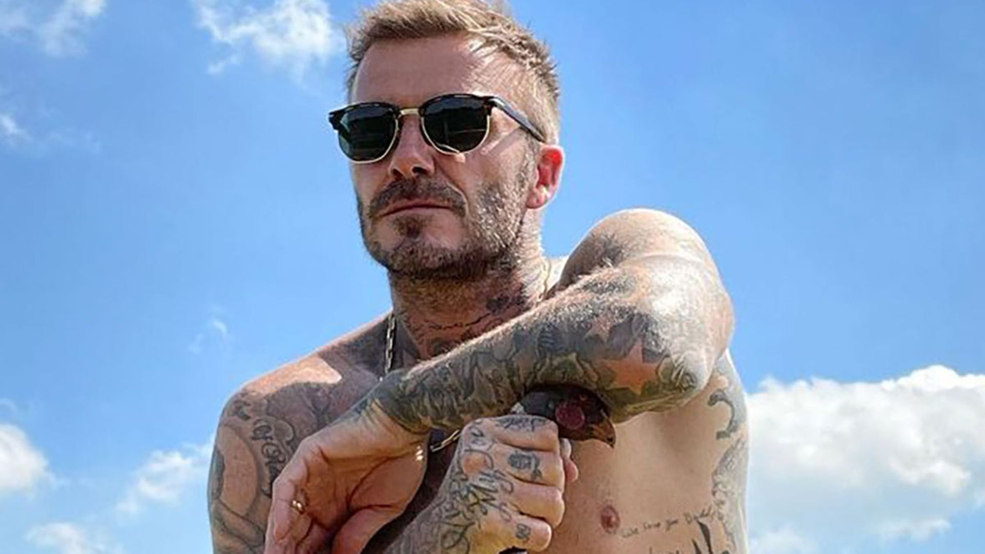 David Beckham sips on cocktail whilst out at sea in dreamy holiday picture